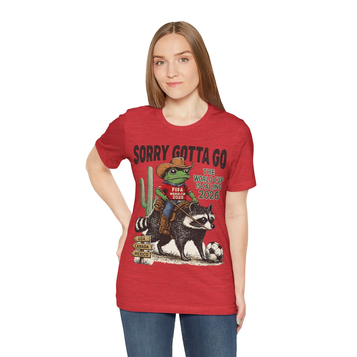 Sorry Gotta Go The World Cup Is Calling 2026" Frog Riding Raccoon( Unisex T-Shirt)🐸🦝⚽🤠